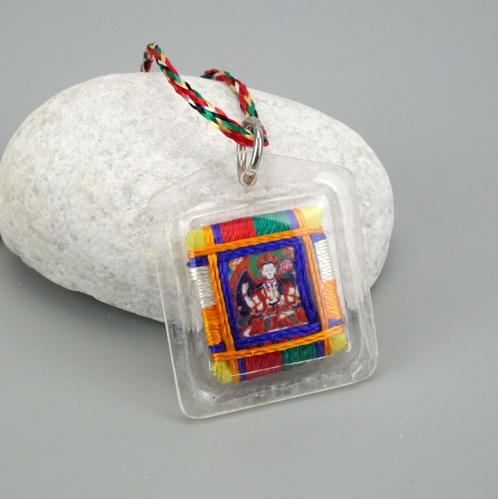 Amuleto Budista Protector Chenrezig